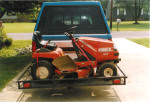 Utility uses for our Tilt-a-Rack hitch mounted trailer system. Lawn Mowers and Landscaping equipment transportation without a trailer.